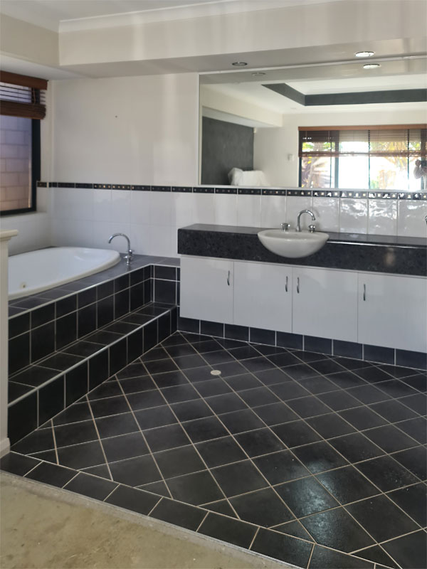 Before photo of a bathroom renovation by Ceramico Tiles & bathrooms Rockingham WA