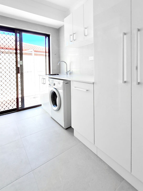 Laundry renovation by Ceramico Tiles & bathrooms after photo